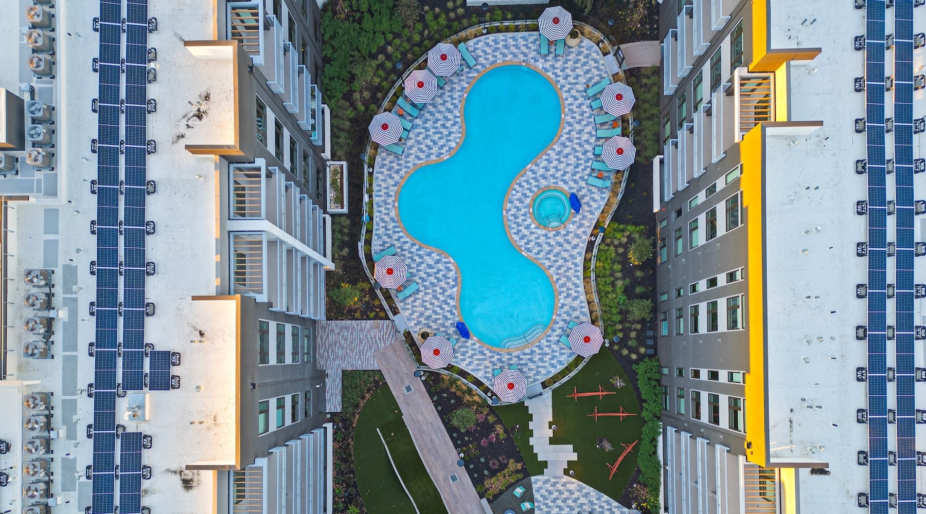 Resort-style swimming pool a swimming pool in a courtyard