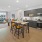 a kitchen with a dining table and chairs