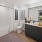 a bathroom with a tub toilet and sink