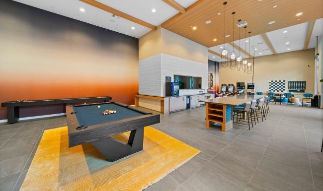 Find your perfect fit at Leya a large room with tables and chairs