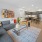 a living room with a couch and a table