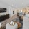 a living room with a tv and couches