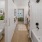 a bathroom with a tub and toilet