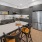 a kitchen with a table and chairs