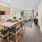 a kitchen with wooden cabinets