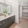 a bathroom with a large mirror